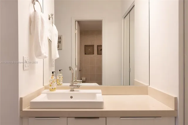 a bathroom with a bathtub and a sink