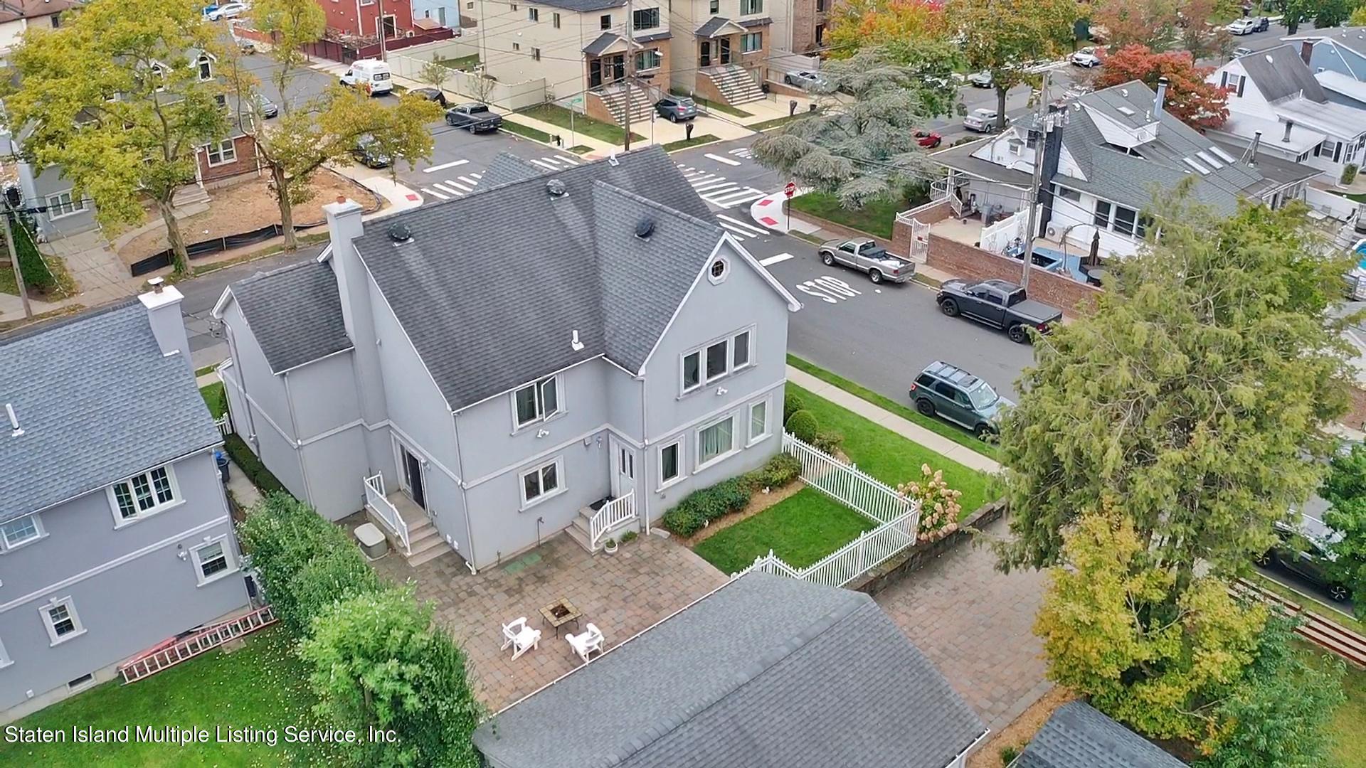 65 Lander Avenue Staten Island, NY 10314 - Photo 2 of 53 an aerial view of a house with a yard