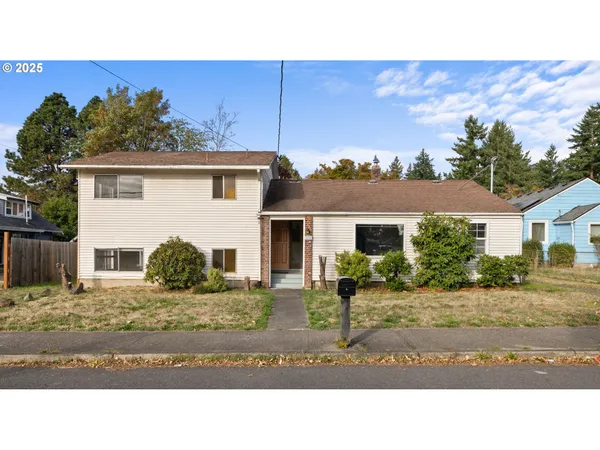a black and white photo of a house