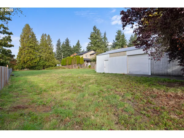 a backyard of a house with lots of green space