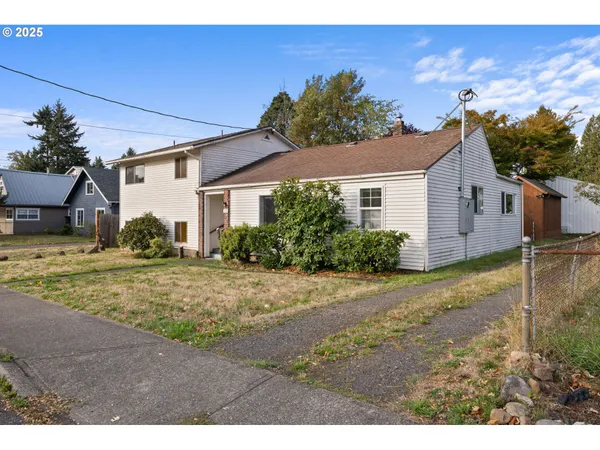 a house view with a backyard space