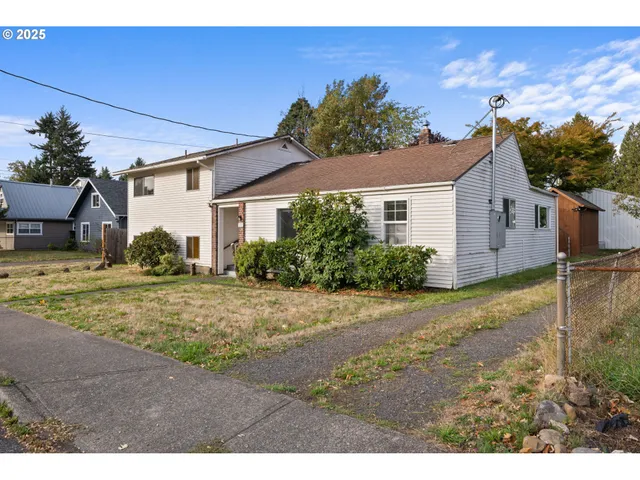 a house view with a backyard space