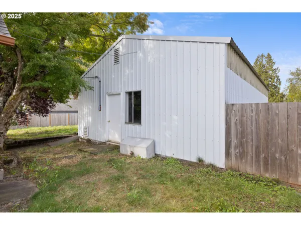a house view with a backyard space