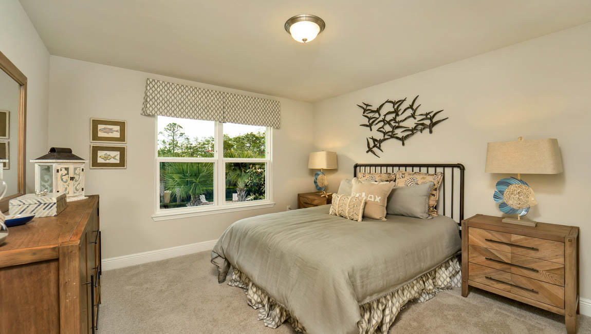 260 Southern Pnes Road, Unit LOT 26 Santa Rosa Beach, FL 32459 - Photo 13 of 15 a bedroom with a bed and a window