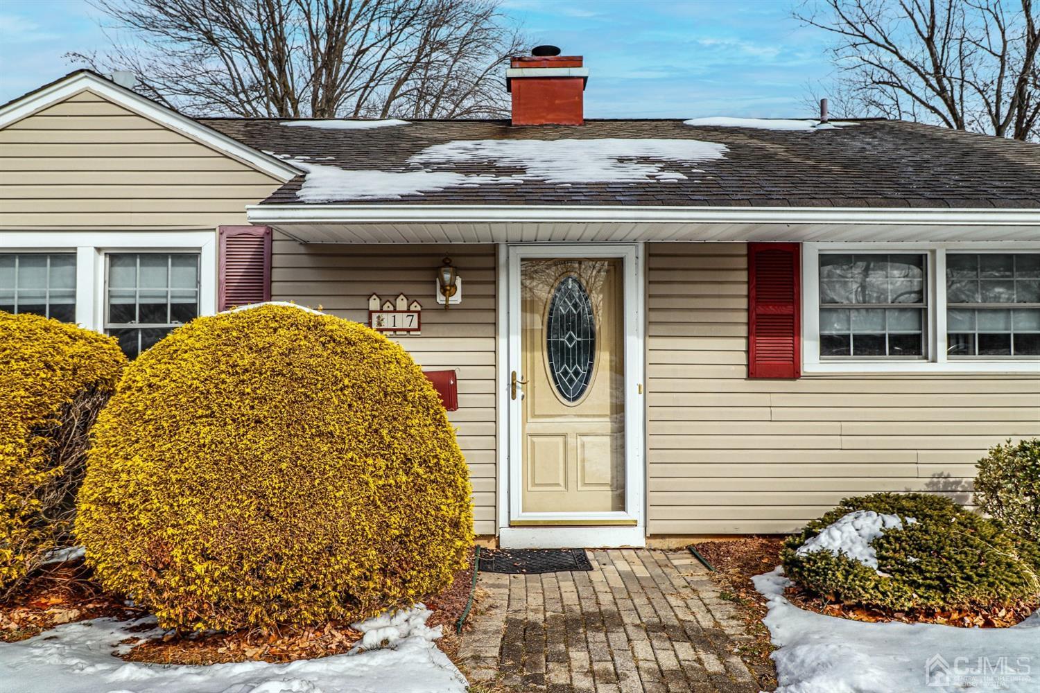 17 Dayton Road Edison, NJ 08817 - Photo 1 of 25 a front view of a house with a garden