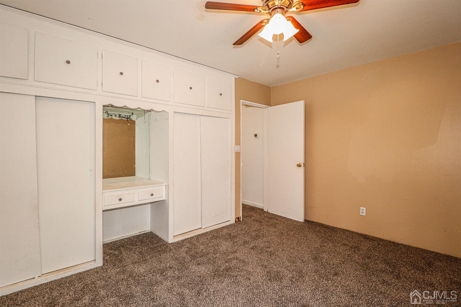 17 Dayton Road Edison, NJ 08817 - Photo 14 of 25 a view of an empty room with a ceiling fan