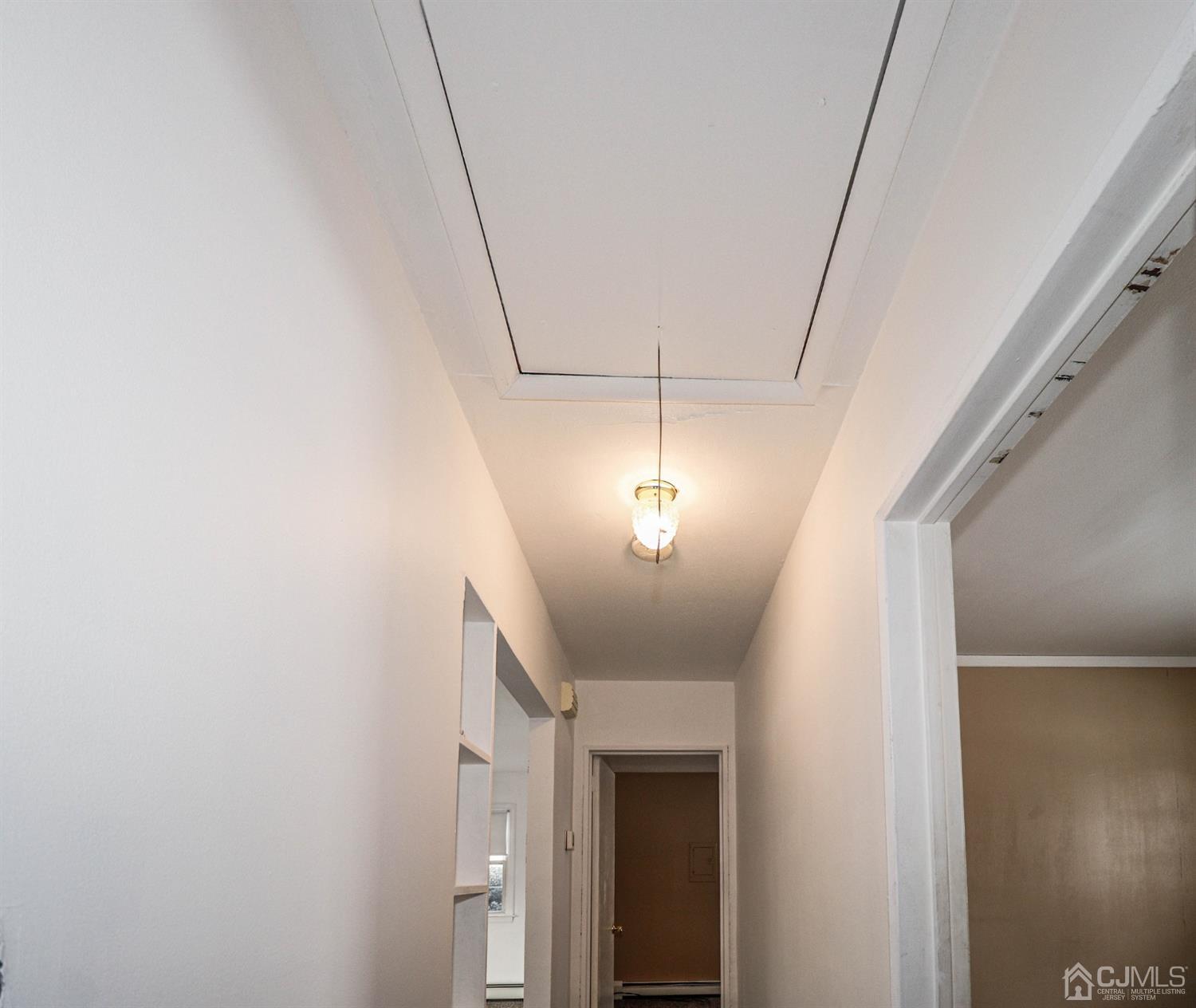17 Dayton Road Edison, NJ 08817 - Photo 15 of 25 a view of a livingroom with a chandelier