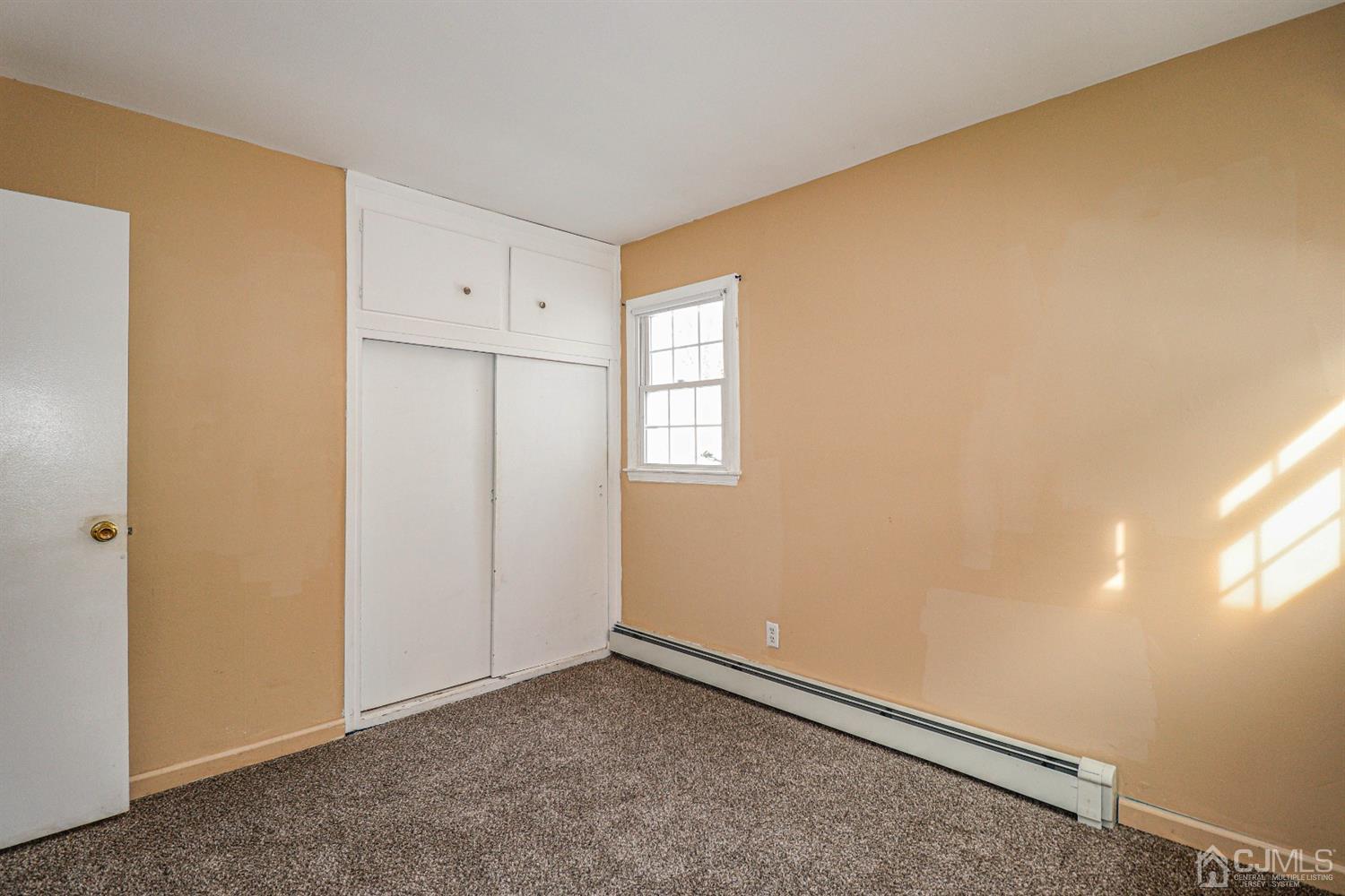 17 Dayton Road Edison, NJ 08817 - Photo 17 of 25 a view of an empty room and window