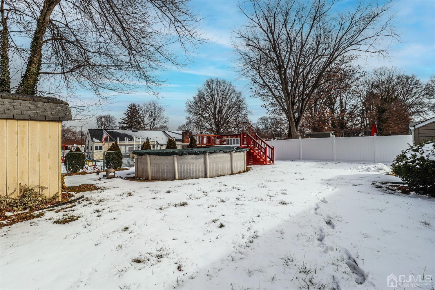 17 Dayton Road Edison, NJ 08817 - Photo 22 of 25 a view of wooden fence of a house