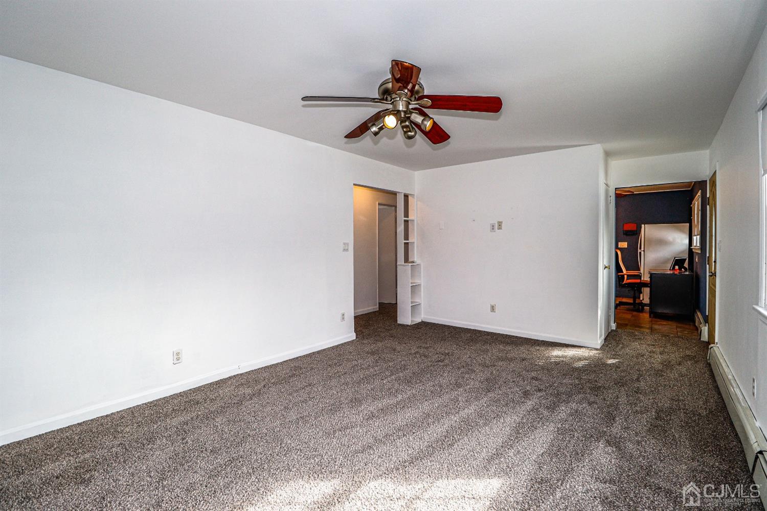 17 Dayton Road Edison, NJ 08817 - Photo 3 of 25 a view of a livingroom with a ceiling fan and window