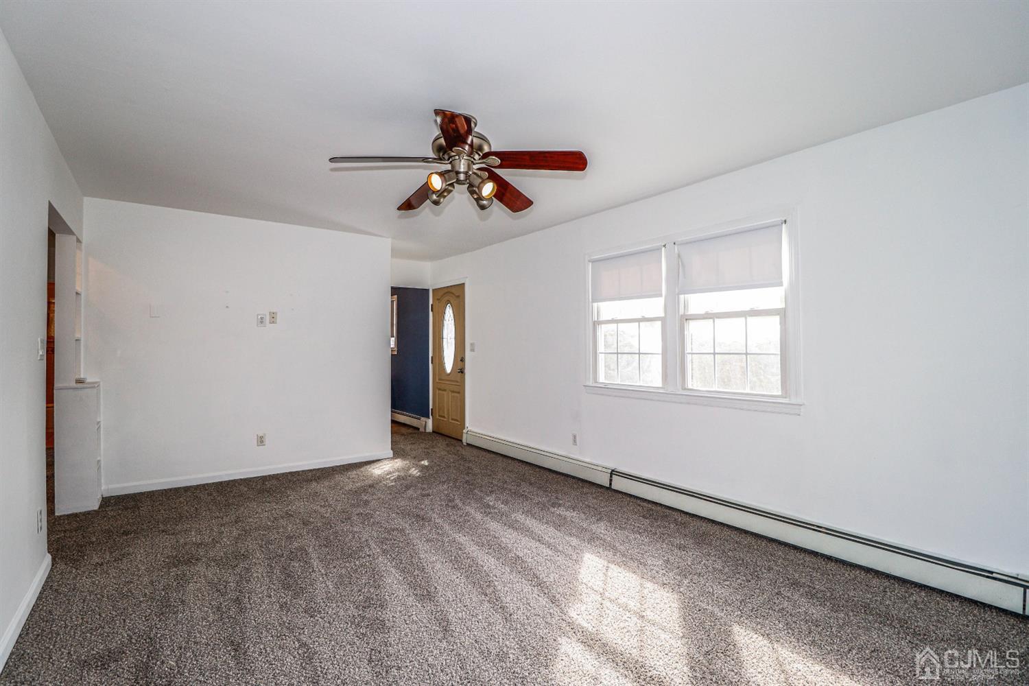 17 Dayton Road Edison, NJ 08817 - Photo 4 of 25 a view of room with a ceiling fan