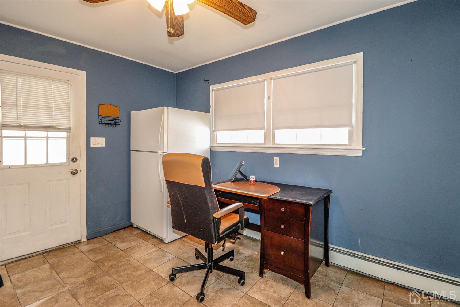 17 Dayton Road Edison, NJ 08817 - Photo 6 of 25 a workspace with chandelier and a window