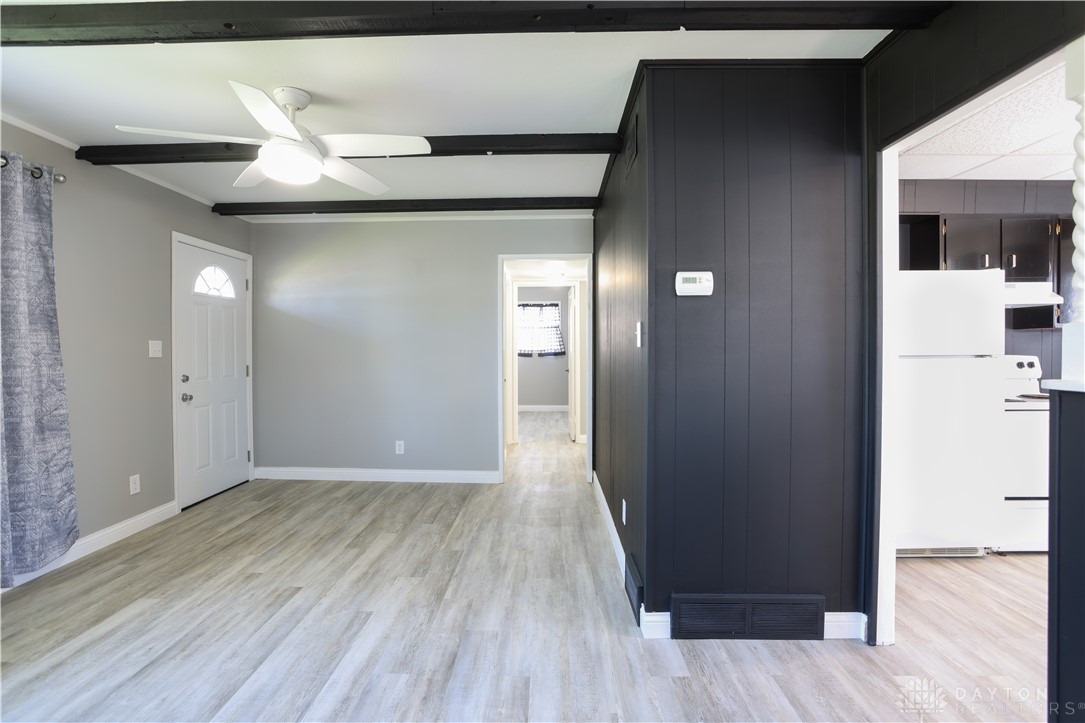 1627 Joselin Road Dayton, OH 45432 - Photo 13 of 28 This bright living space features wood flooring and a refreshing ceiling fan.