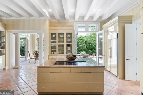 a view of a patio with swimming pool