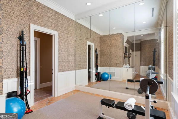 a view of a house with swimming pool and sitting area