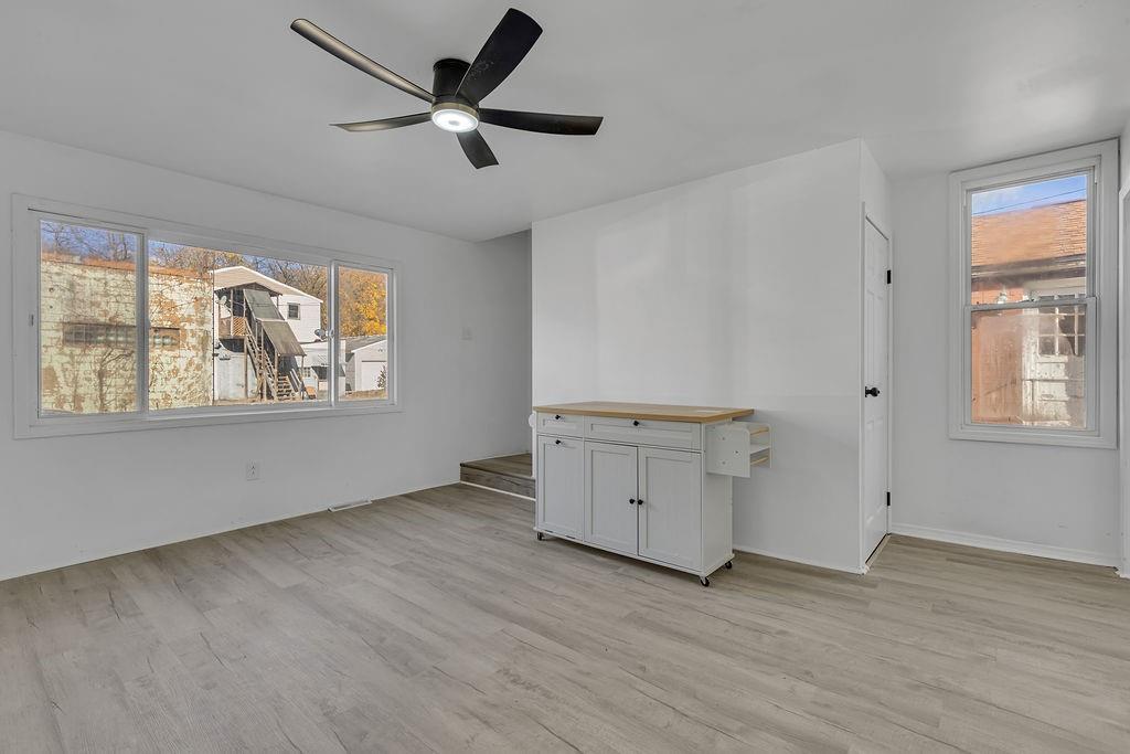 498 Blockhouse Run Road New Brighton, PA 15066 - Photo 11 of 23 wooden floor in an empty room with a window