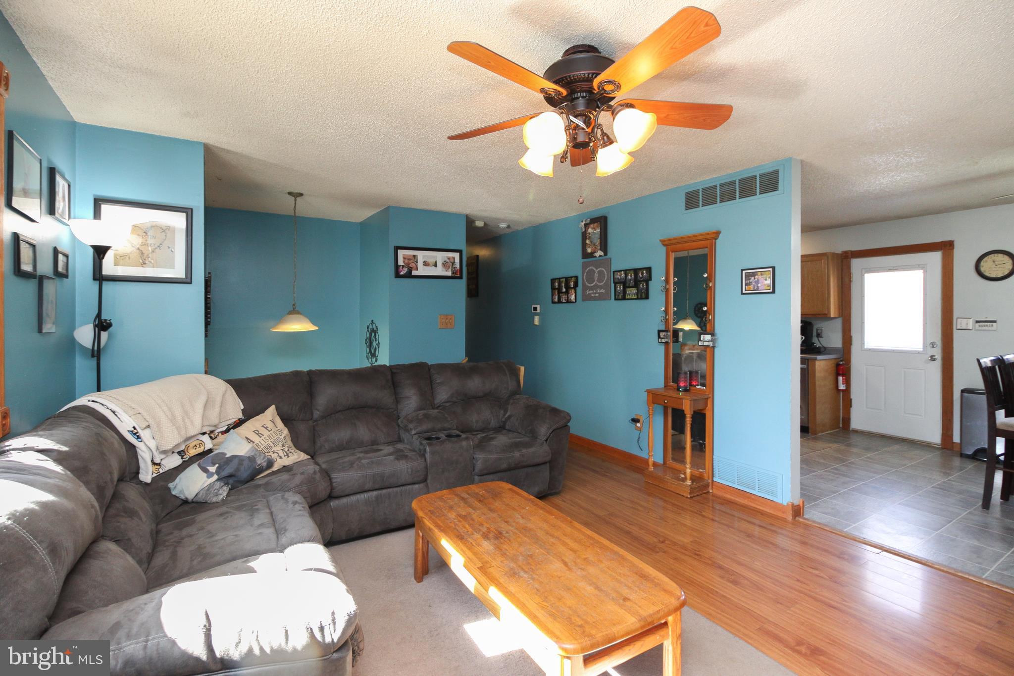 291 Grubb Road Newfield, NJ 08344 - Photo 5 of 34 Living Room with Hardwood flooring to hallway