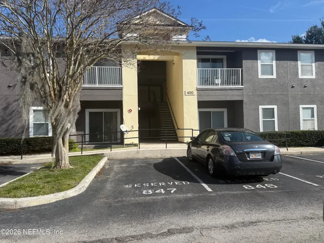 a car parked in front of a house