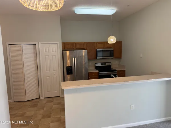 a bathroom with a sink and a window