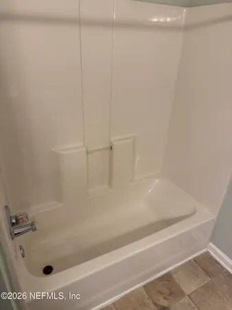 a bathroom with a sink a toilet and vanity