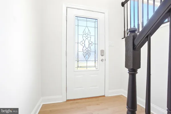 a view of hallway with windows