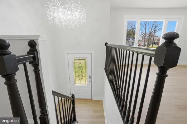 a view of a hallway with windows