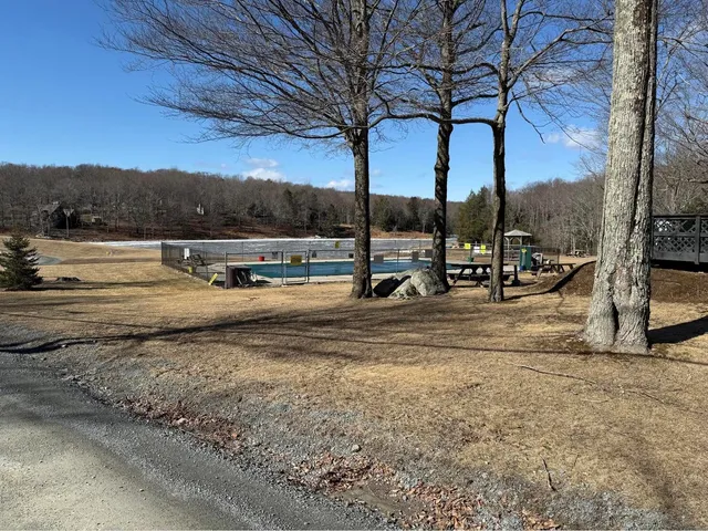 a view of outdoor space with lots of trees