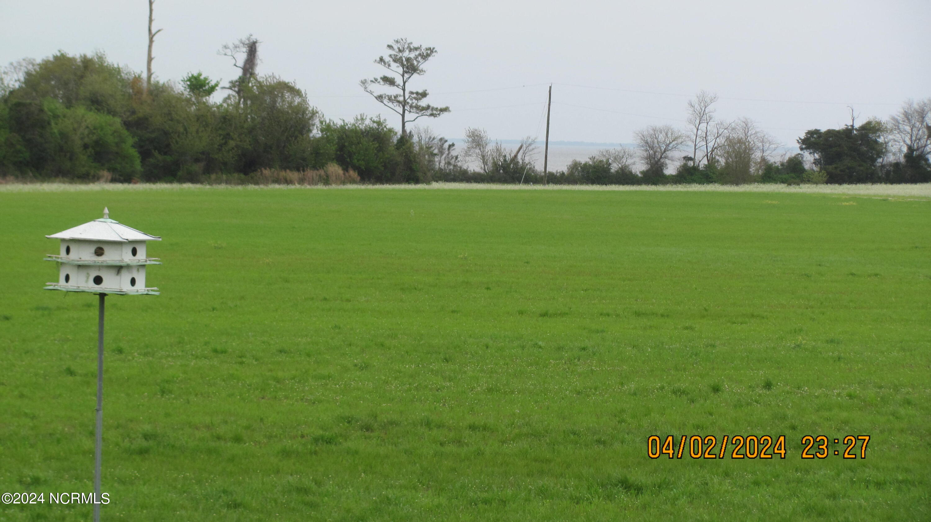 View from covered porch to Currituck Sound. Field area has protection until 2050.