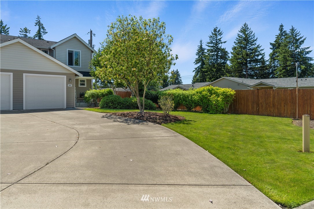 6309 199th Loop Southwest Rochester, WA 98579 - Photo 3 of 27 a view of a front of house with a yard