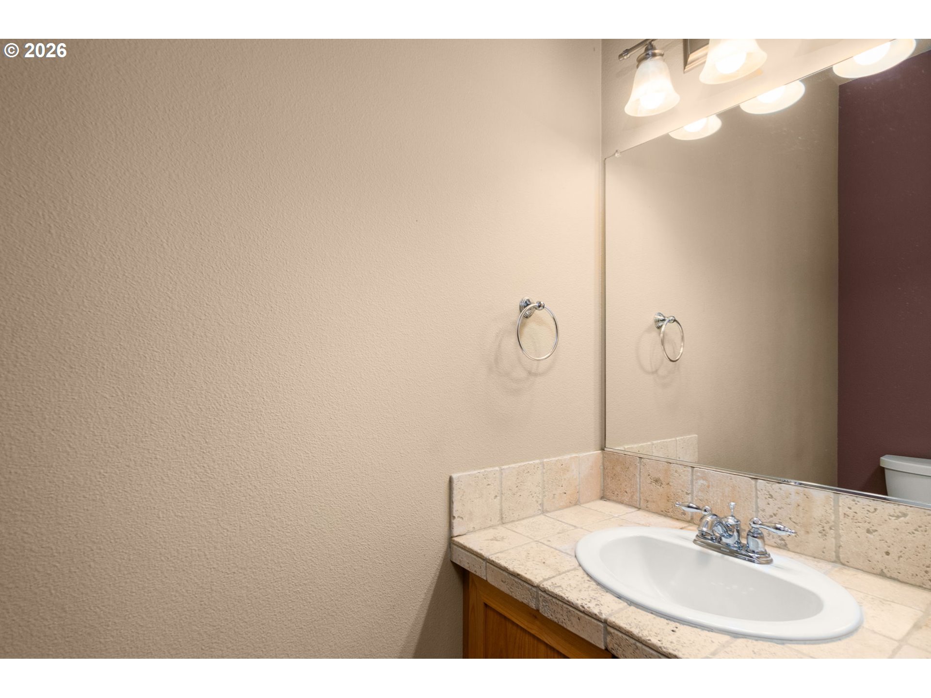 1060 Southwest 170th Avenue, Unit 202 Beaverton, OR 97003 - Photo 15 of 27 a bathroom with a sink and a mirror