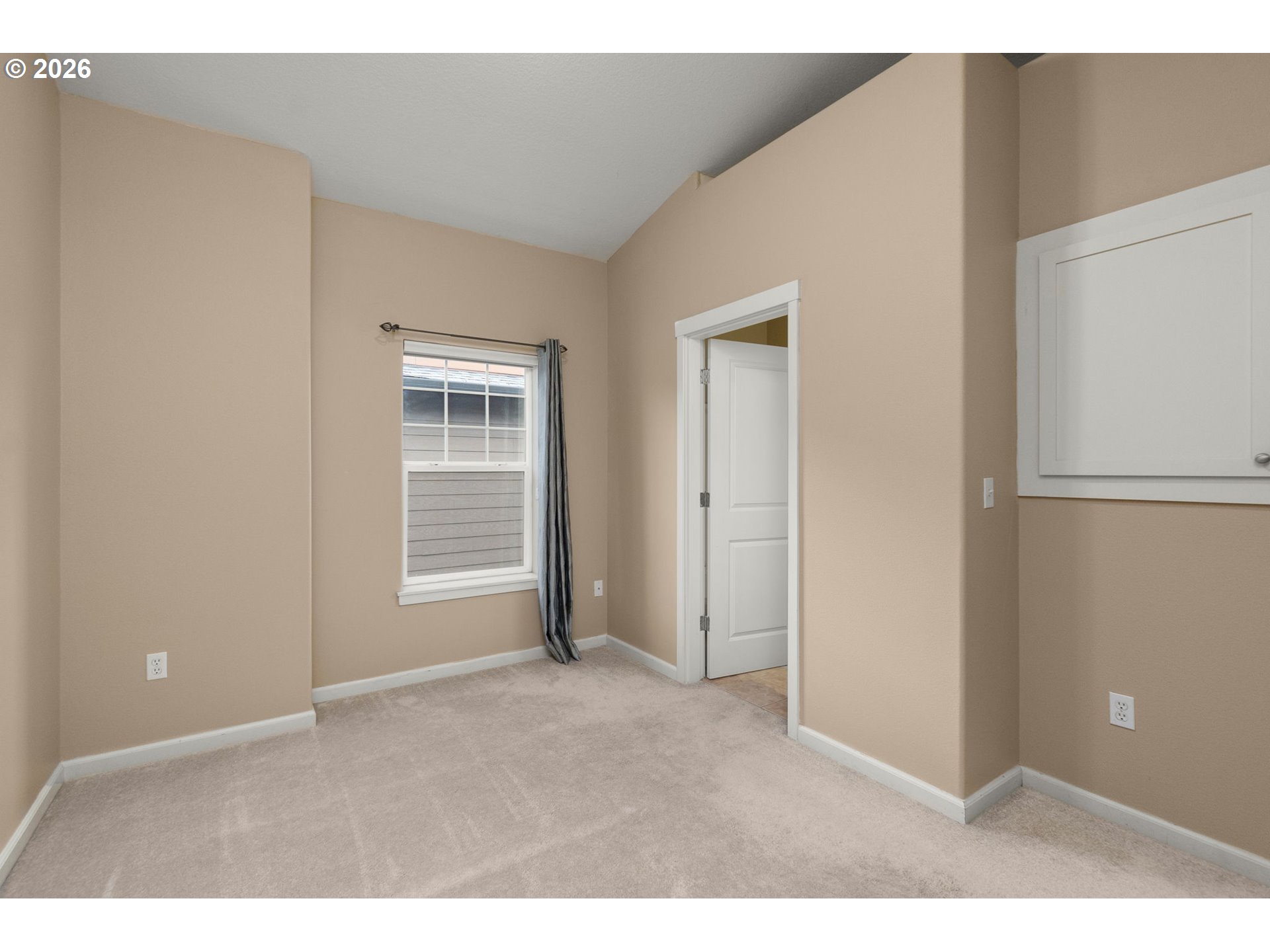 1060 Southwest 170th Avenue, Unit 202 Beaverton, OR 97003 - Photo 23 of 27 a view of an empty room with a window