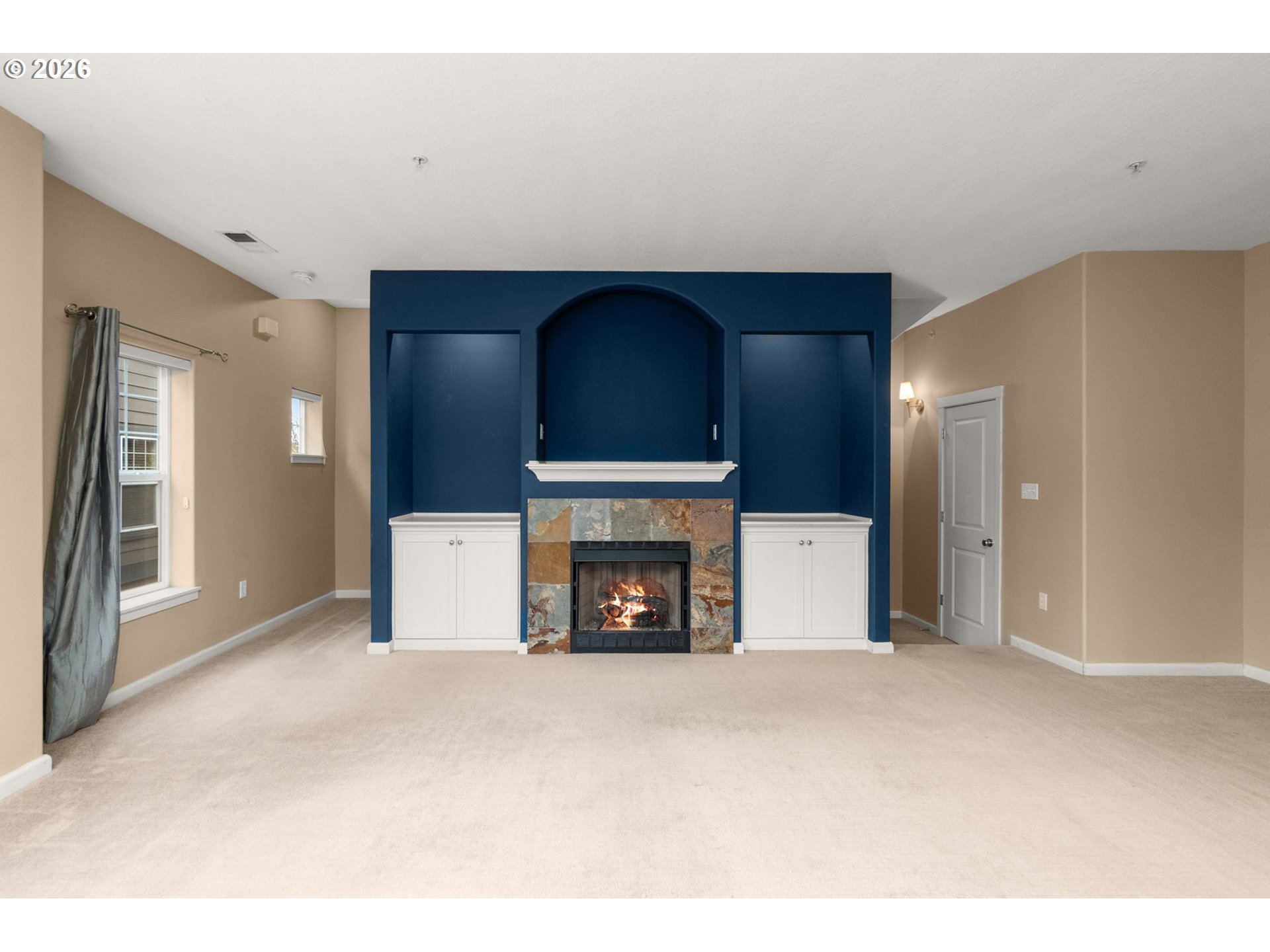 1060 Southwest 170th Avenue, Unit 202 Beaverton, OR 97003 - Photo 5 of 27 a view of a livingroom with a fireplace