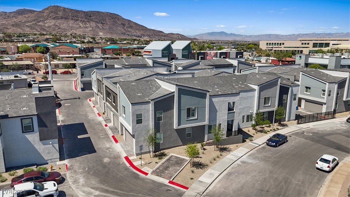 143 Aqua Commons Lane Henderson, NV 89015 - Photo 13 of 20 Aerial view of residential area featuring mountains