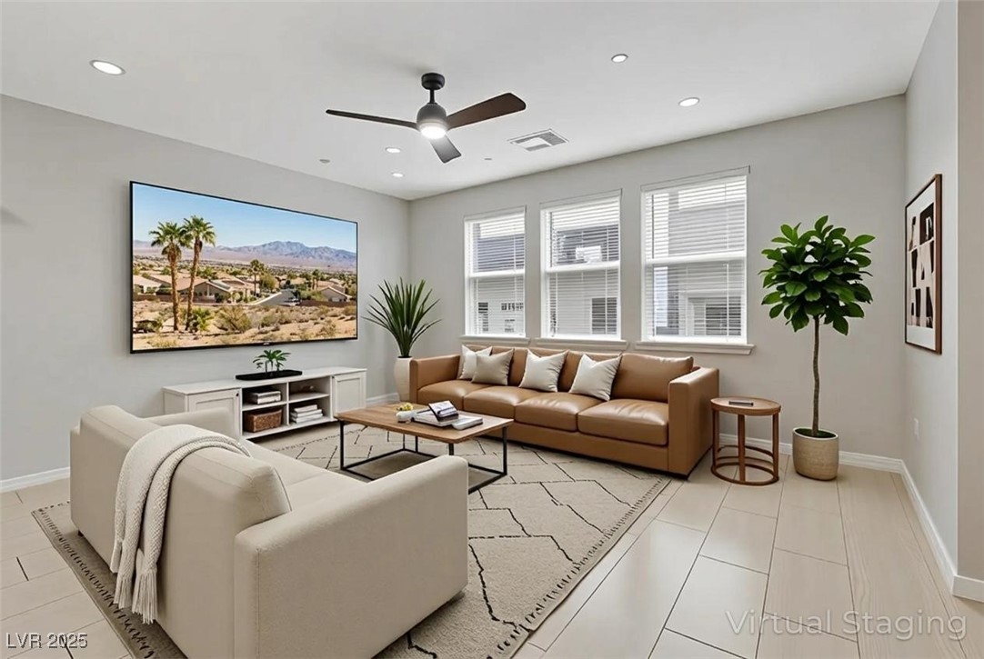 143 Aqua Commons Lane Henderson, NV 89015 - Photo 4 of 20 Living area with recessed lighting, ceiling fan, and light tile patterned flooring