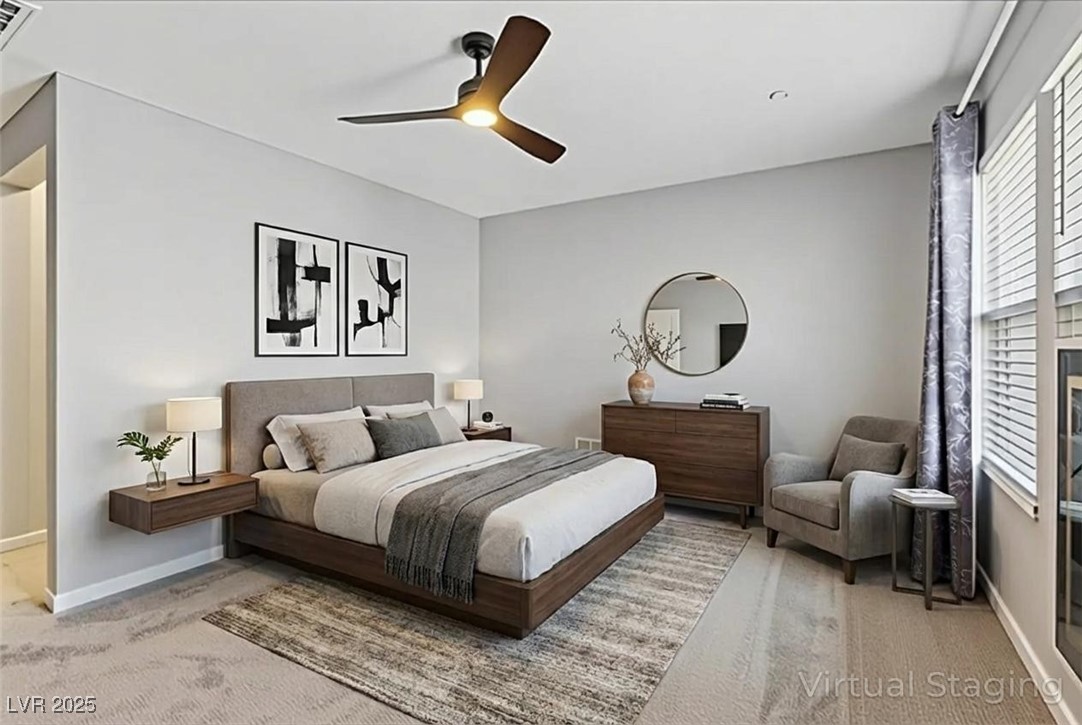 143 Aqua Commons Lane Henderson, NV 89015 - Photo 8 of 20 Bedroom with ceiling fan and light carpet