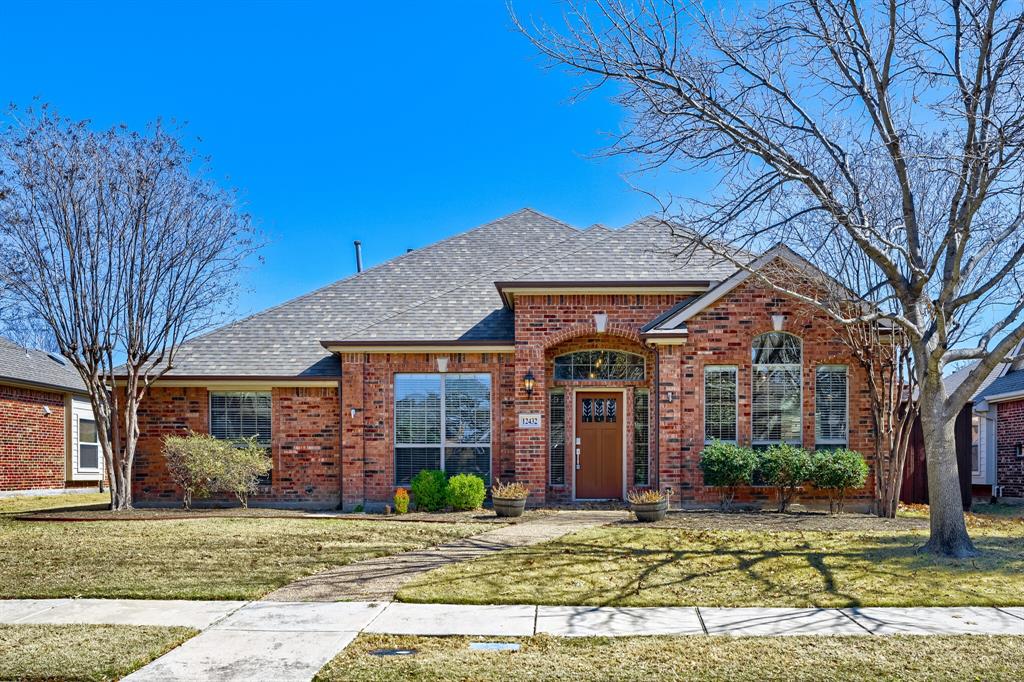 12432 Blue Ridge Drive Frisco, TX 75033 - Photo 1 of 1 a front view of a house with garden