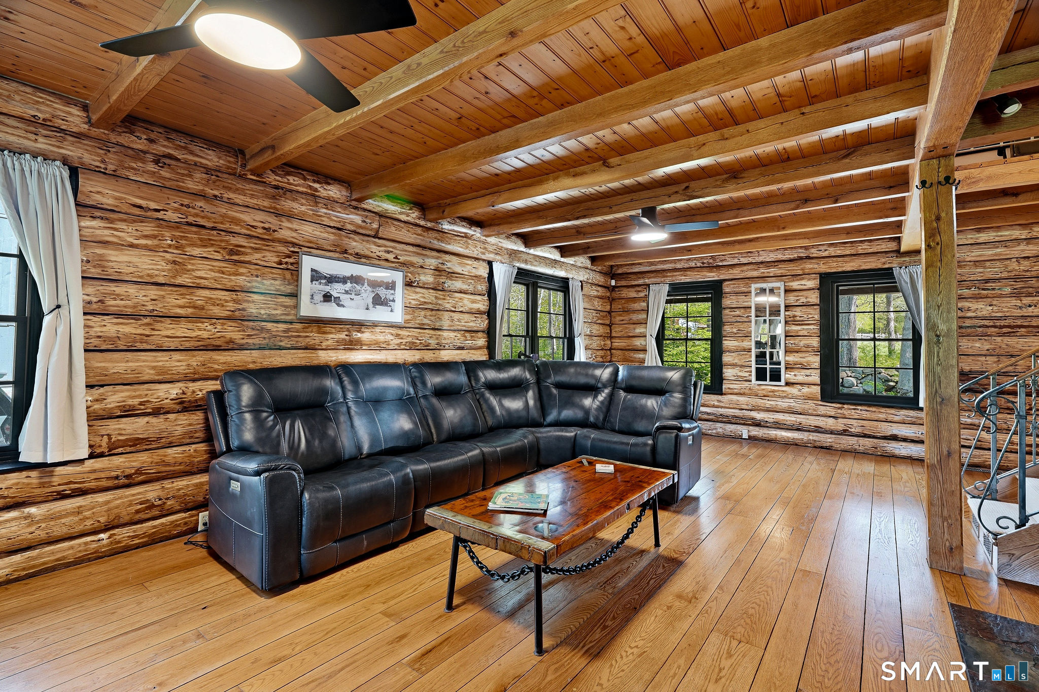 61 Mystic Road North Stonington, CT 06359 - Photo 15 of 40 a outdoor living space with furniture and wooden floor