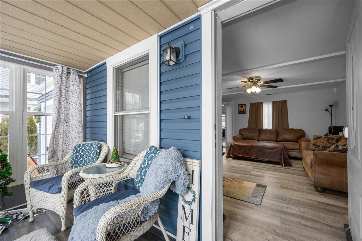 207 Second Street Elgin, IL 60123 - Photo 3 of 16 a living room with furniture and wooden floor