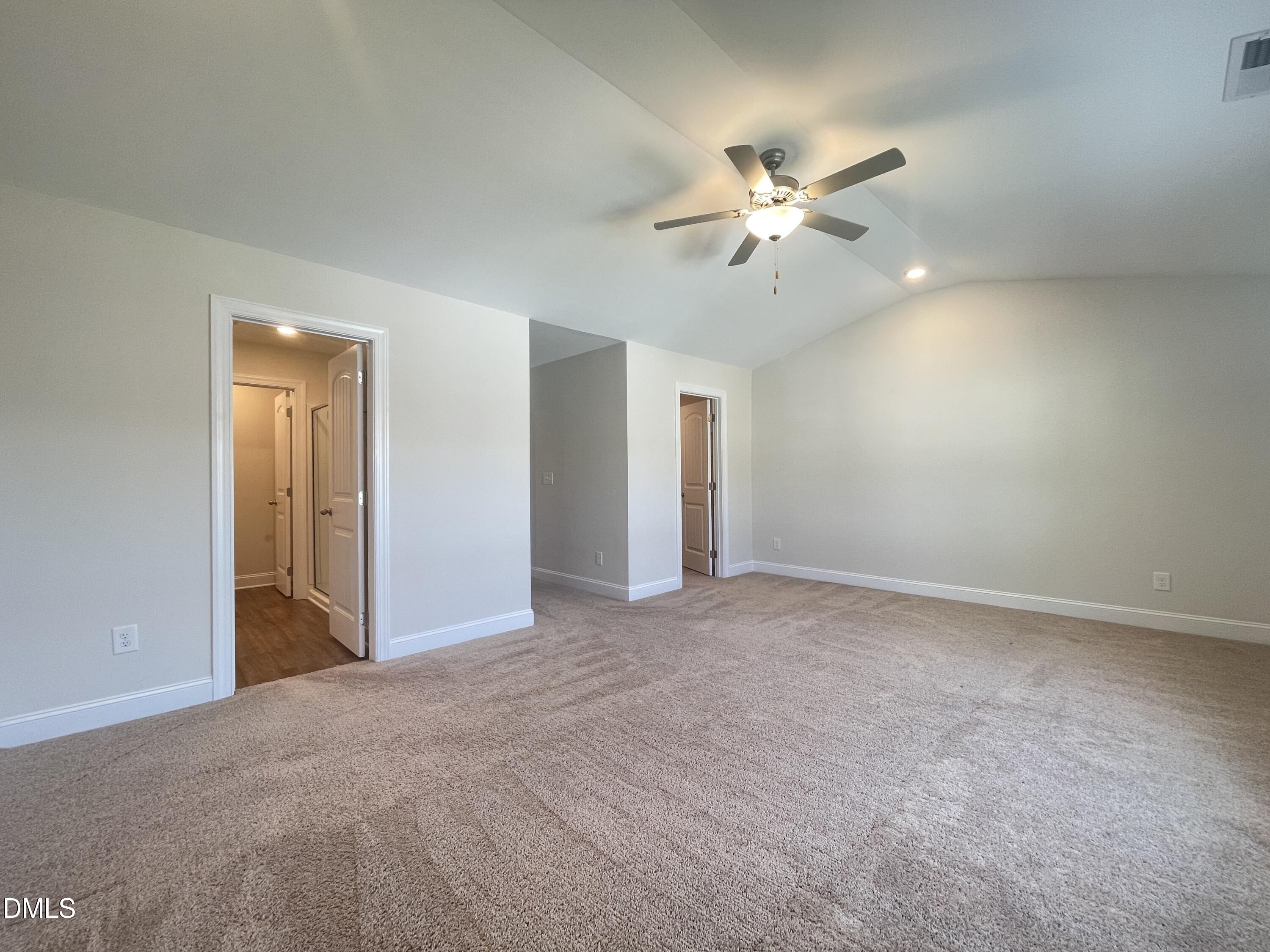 6945 Outfall Point Lane Raleigh, NC 27616 - Photo 12 of 23 a view of a livingroom with a ceiling fan and window