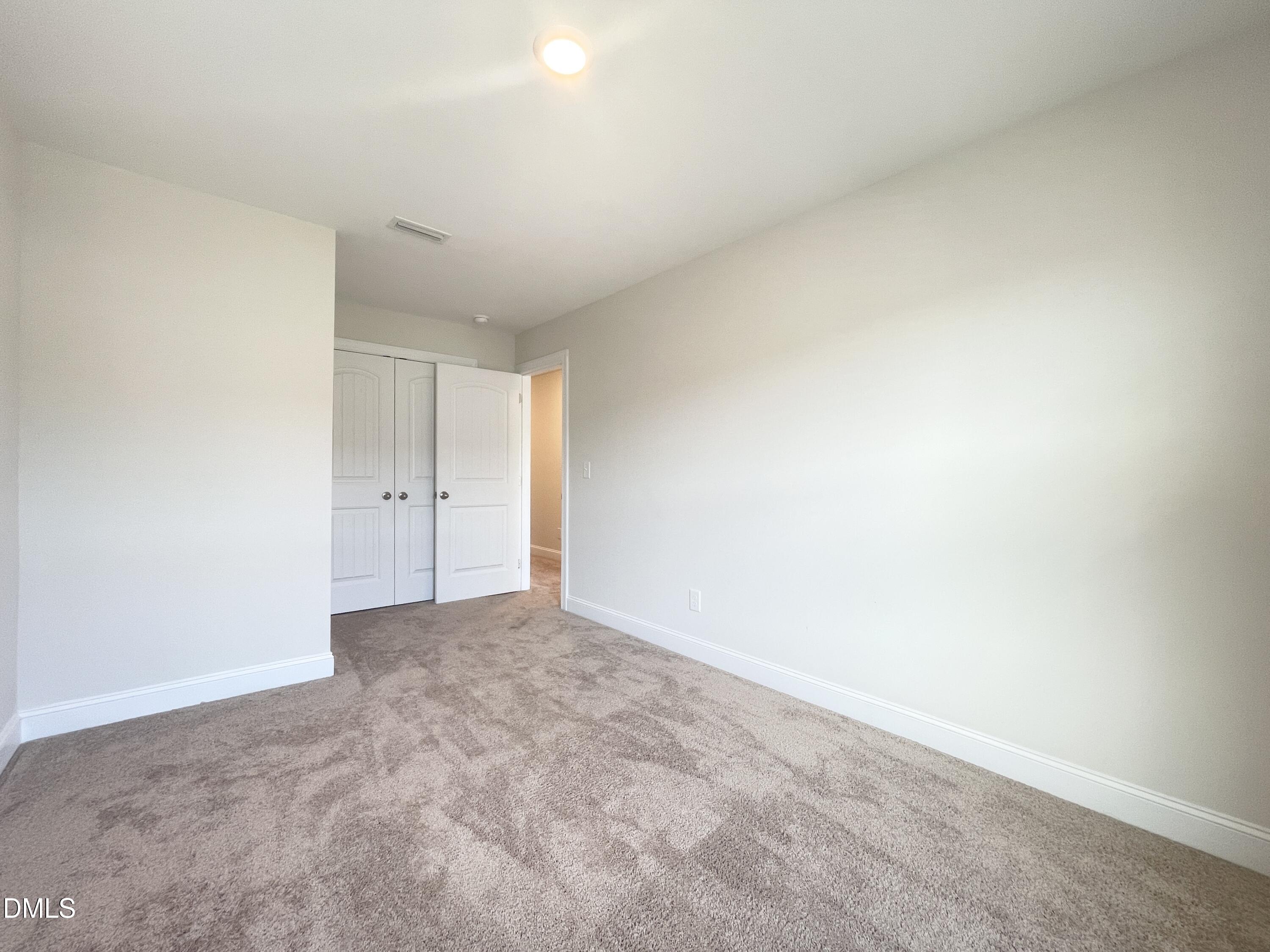 6945 Outfall Point Lane Raleigh, NC 27616 - Photo 18 of 23 a view of an empty room