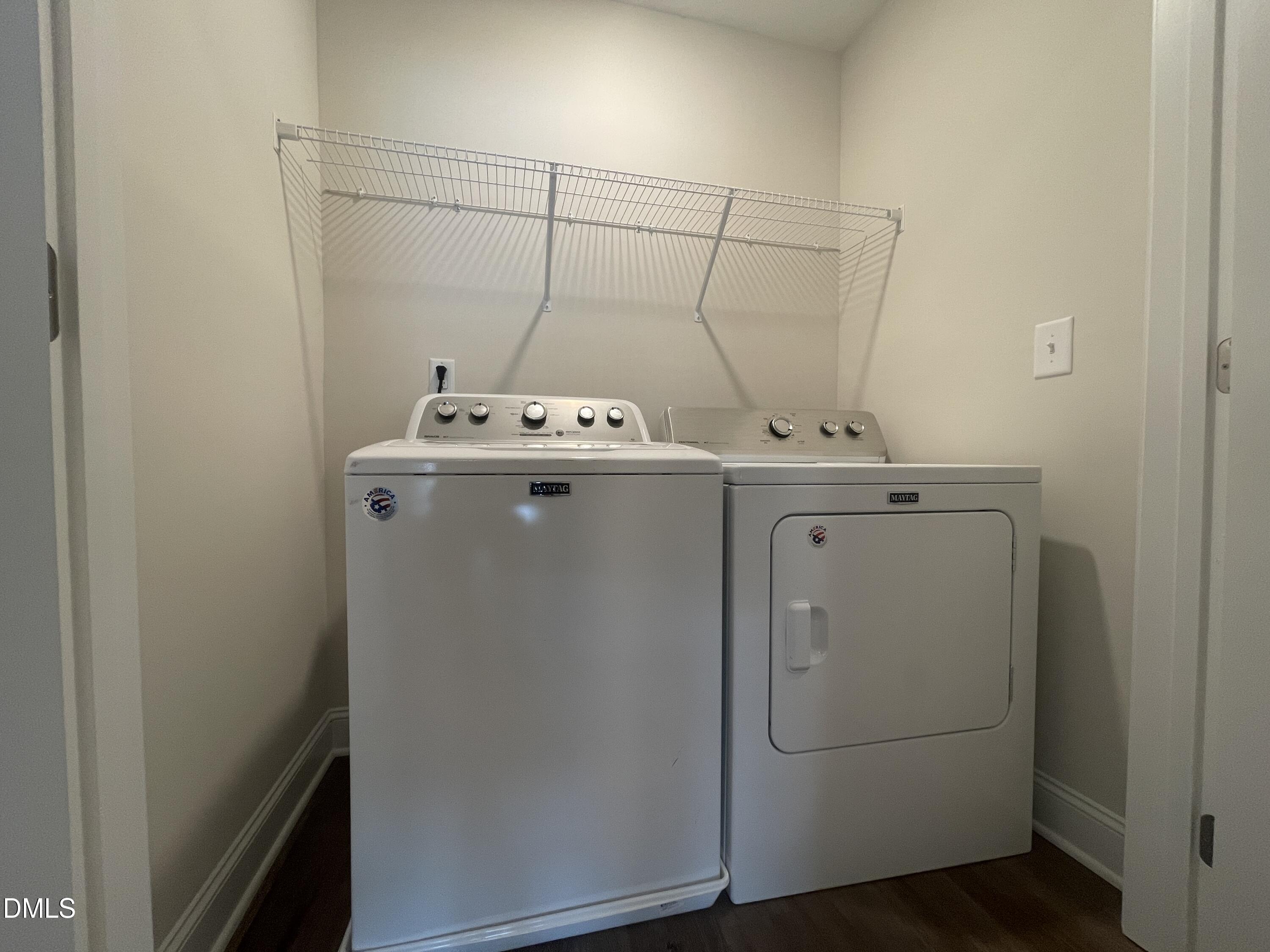 6945 Outfall Point Lane Raleigh, NC 27616 - Photo 23 of 23 a utility room with dryer and washer