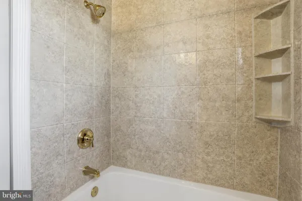 a bathroom with a bathtub