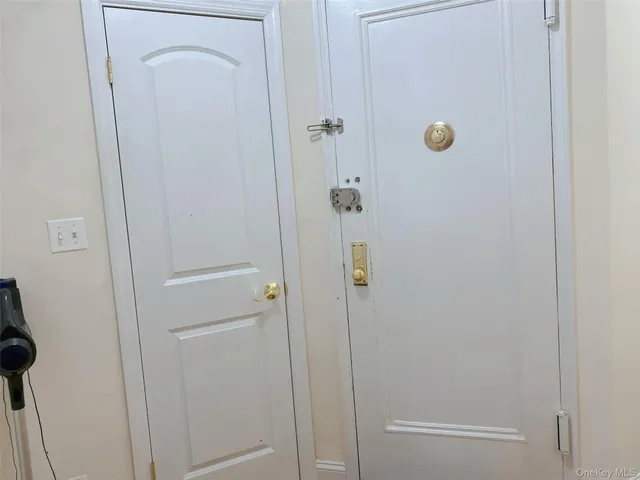 a bathroom with a granite countertop shower