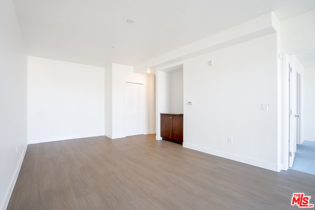 629 Traction Avenue, Unit 239 Los Angeles, CA 90013 - Photo 15 of 44 a view of an empty room and wooden floor