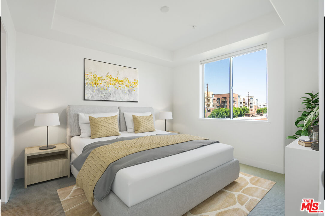 629 Traction Avenue, Unit 239 Los Angeles, CA 90013 - Photo 16 of 44 a bedroom with a bed and a painting on the wall