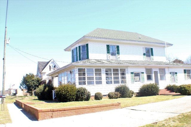 9593 Atlantic Road Atlantic, VA 23303 - Photo 18 of 20 a front view of a house with a yard