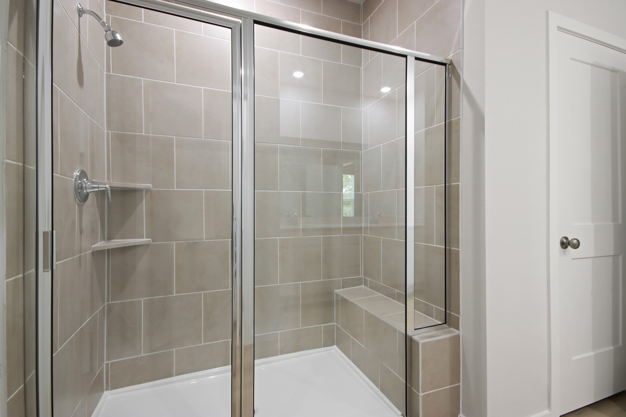 129 Byu Bnd Boulevard Angleton, TX 77515 - Photo 11 of 25 a bathroom with a glass shower door