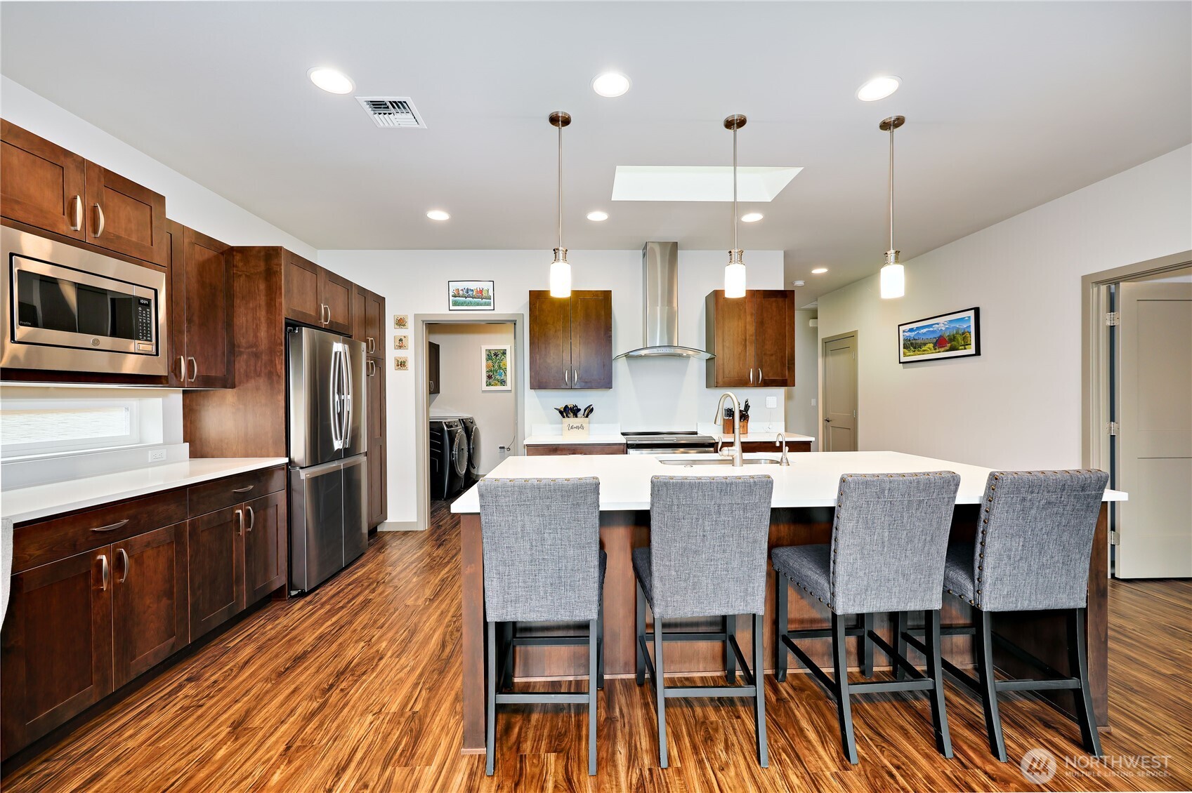 90 Village Green Sequim, WA 98382 - Photo 15 of 40 a large kitchen with a table and chairs