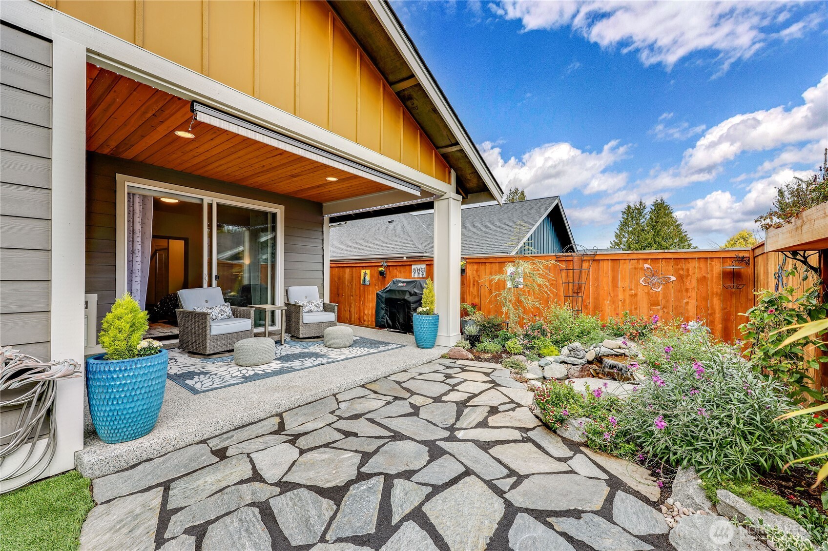 90 Village Green Sequim, WA 98382 - Photo 31 of 40 a view of outdoor kitchen and patio