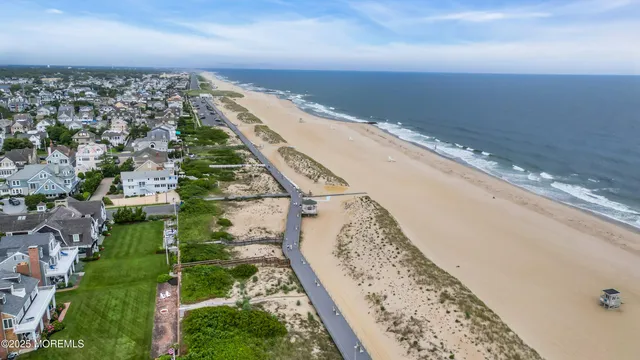 an aerial view of beach and ocean